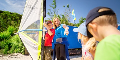 Campingplätze - Wassersport: Angelberechtigungsschein - Surfschule auf dem Ostseecampingplatz Familie Heide. - Ostseecamping Heide